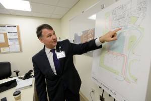 Mark Sparta, CEO of HackensackUMC at Pascack Valley, with the plans for the hospital’s new emergency department, which he called the “front door” of any hospital.