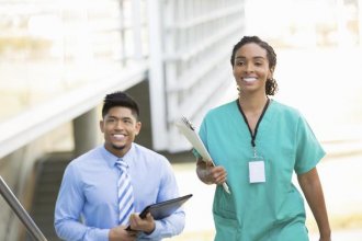 Nurses walking down the hallway.