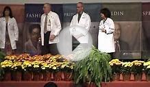 KEERTHAN RECEIVING WHITE COAT FROM UT SOUTHWESTERN MEDICAL